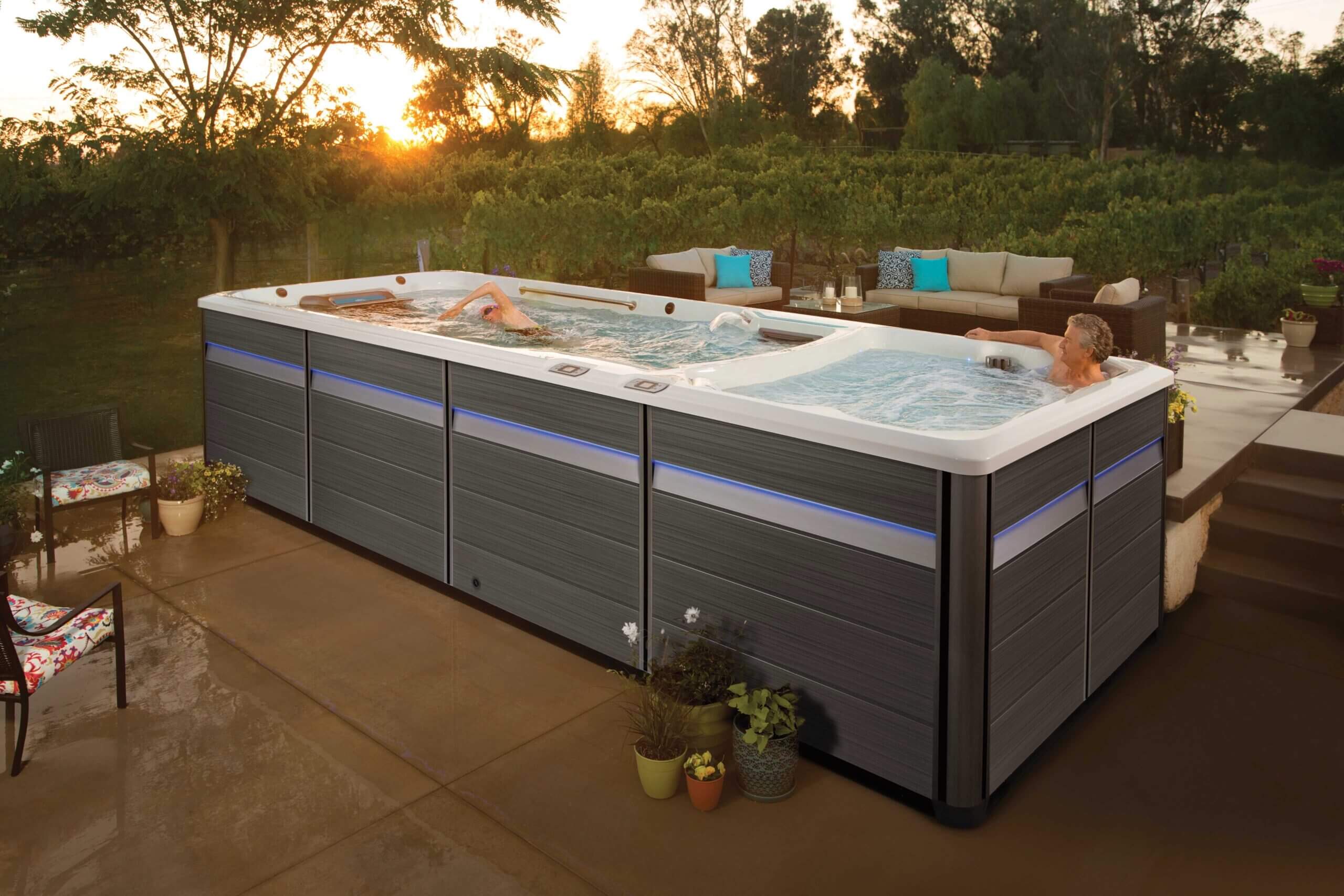 Endless Pools dual-temperature swim spa with separate hot tub section
