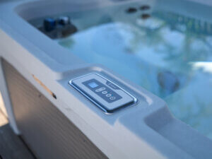 Hot tub control panel set to heat during off-peak electricity hours